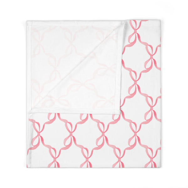 Baby Swaddle Blanket in watercolor bow print pattern - pink and white for boys or girls