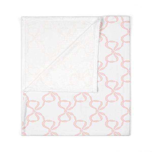 Baby Swaddle Blanket in watercolor bow print pattern - soft blush pink and white for girls, preppy baby nursery, preppy room decor